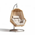 Hanging rattan chair with cushioned seat for indoor and outdoor use 120 x 100 x 150cm